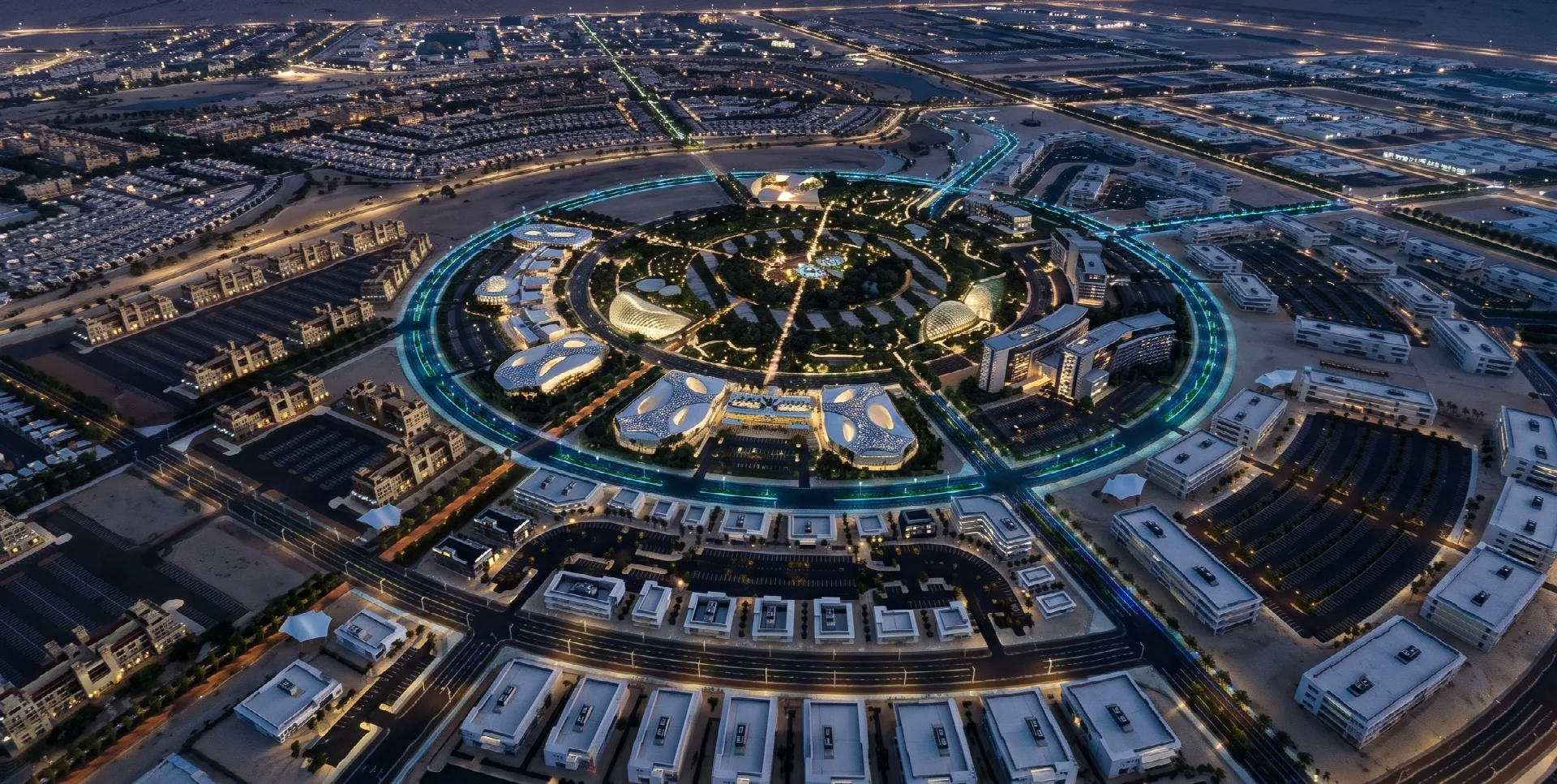 Nighttime aerial view of an urban complex